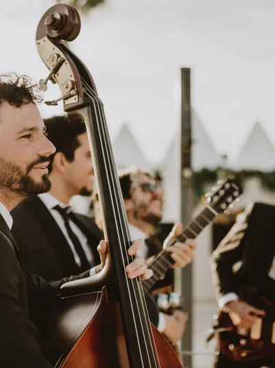 The band engaging with guests
